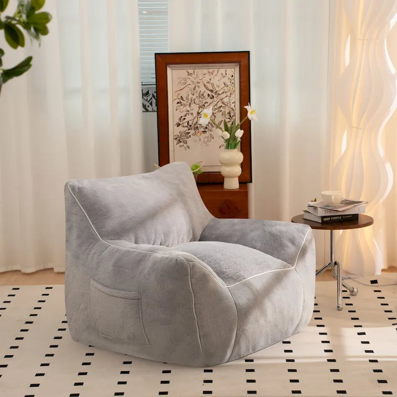 Poltrona a sacco in ecopelliccia con supporto per la schiena, imbottitura in schiuma sminuzzata ad alta densità e design versatile