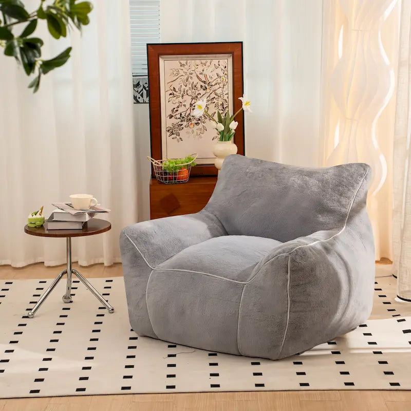 Poltrona a sacco in ecopelliccia con supporto per la schiena, imbottitura in schiuma sminuzzata ad alta densità e design versatile
