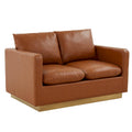 Causeuse moderne en cuir avec base dorée et coussins