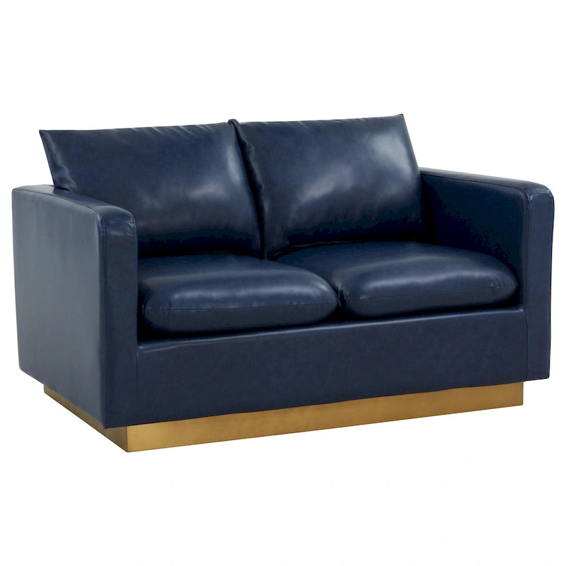 Poltroncina moderna in pelle con base dorata e cuscini