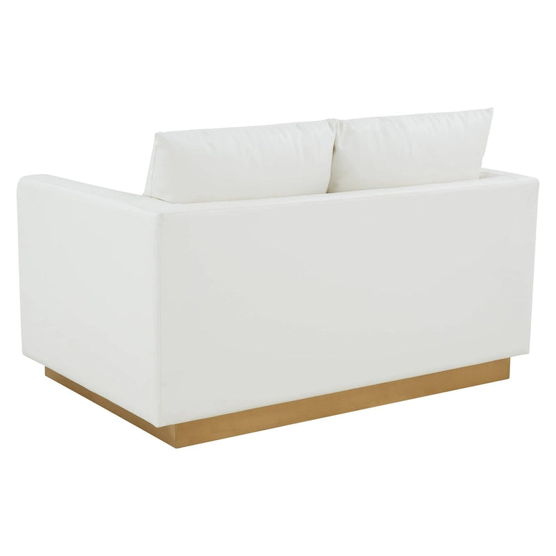 Causeuse moderne en cuir avec base dorée et coussins