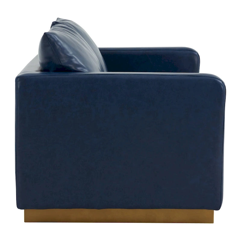 Causeuse moderne en cuir avec base dorée et coussins