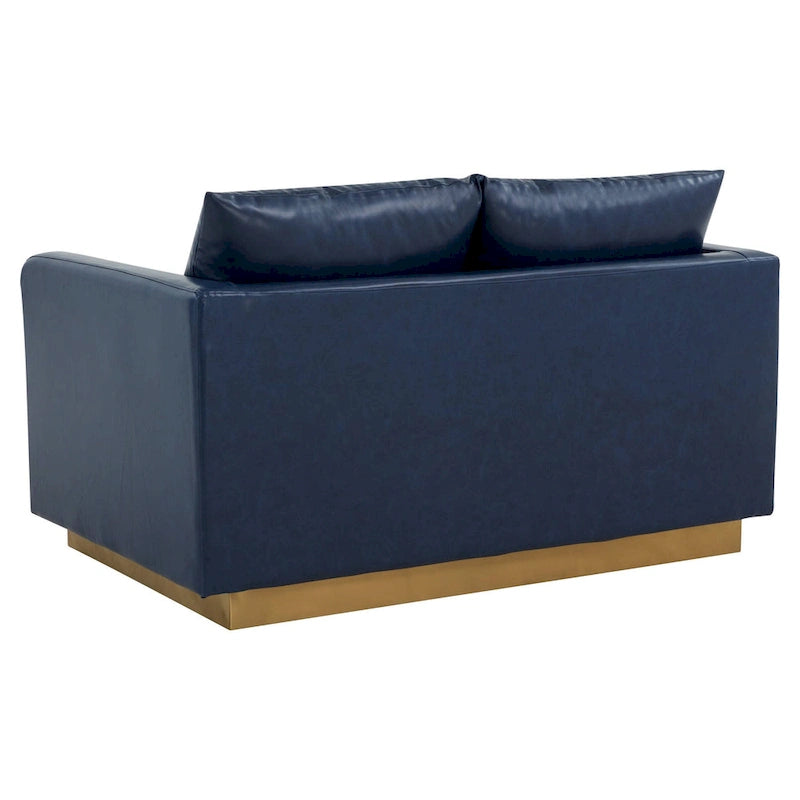 Causeuse moderne en cuir avec base dorée et coussins