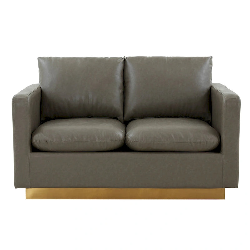 Causeuse moderne en cuir avec base dorée et coussins