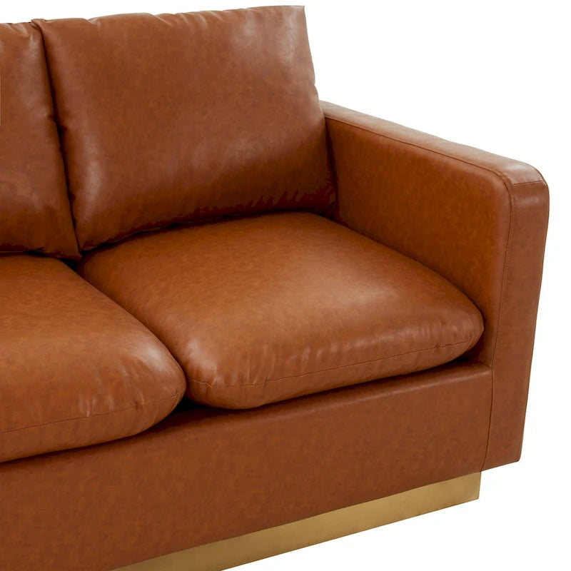 Causeuse moderne en cuir avec base dorée et coussins