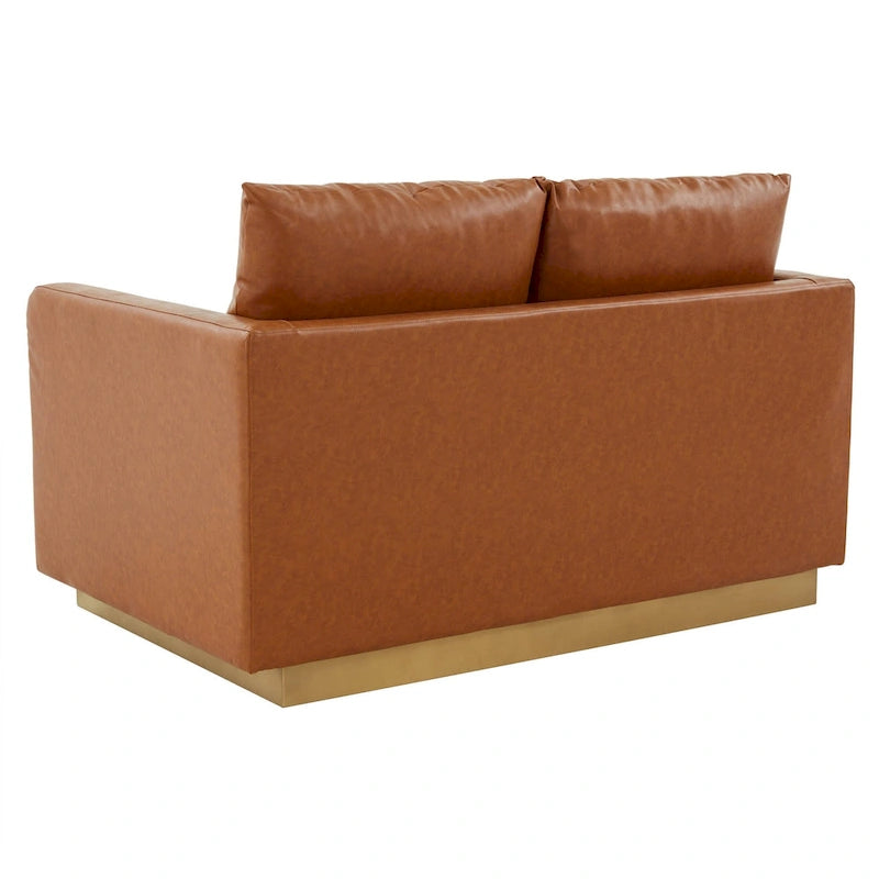 Causeuse moderne en cuir avec base dorée et coussins